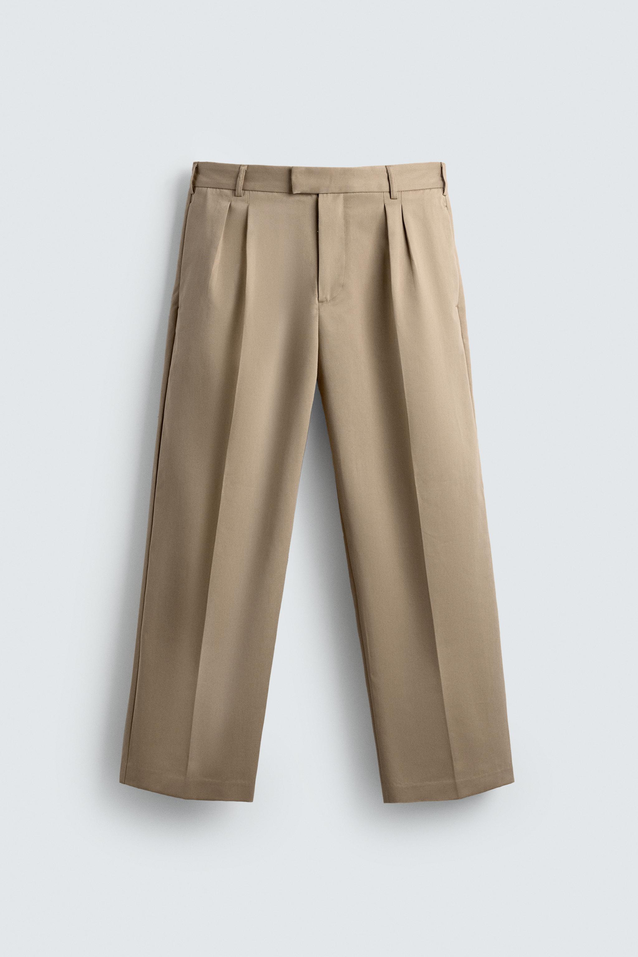 RELAXED FIT PLEATED PANTS